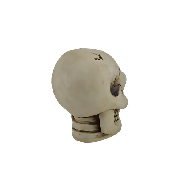 Gothic resin cracked skull statue with spider web and color-changing LED, 8.25 inches high